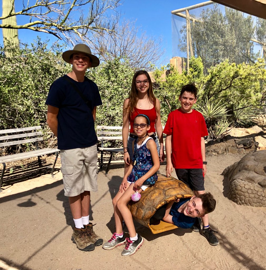 Kaylin and Luke turtiling it with the Smith family kids at the Senora Desert Museum